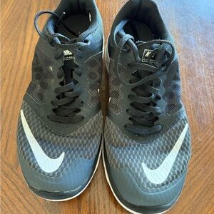 Nike Black Sneakers with Mesh Upper and Modern Design